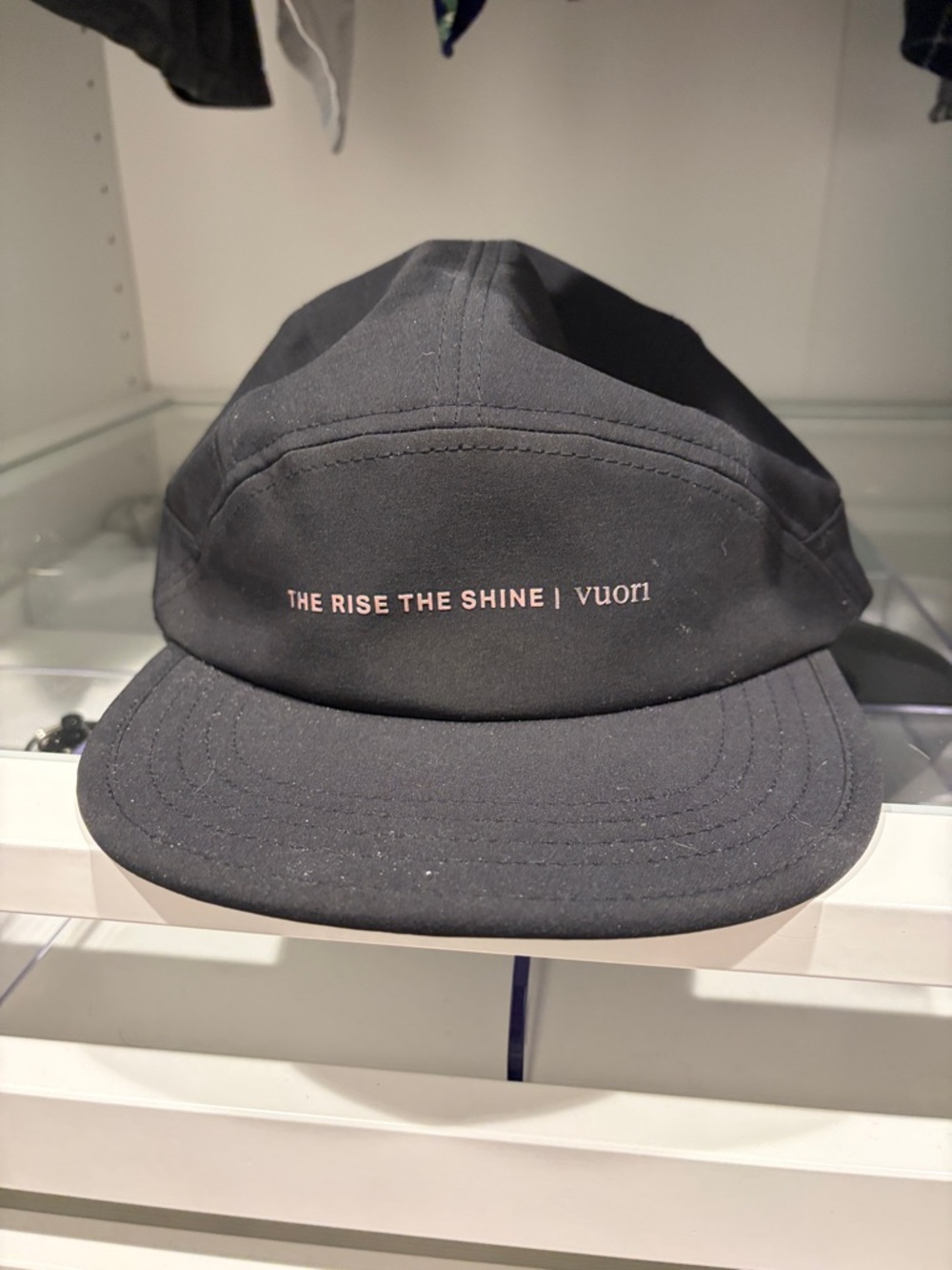 Vuori Black Five-Panel Cap with Pink Accent Text